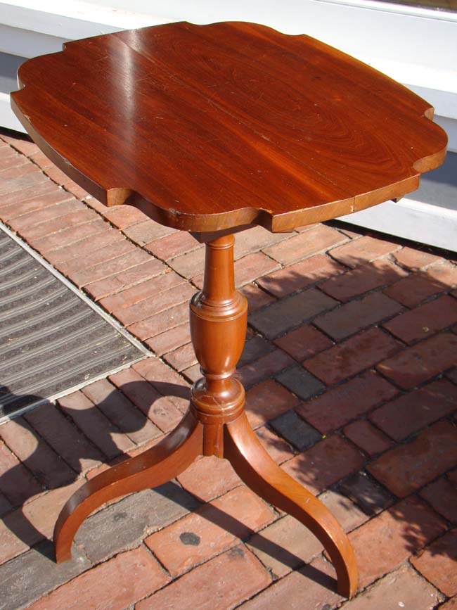 An early 19th century New England made mahogany tilt-top table with birdcage device